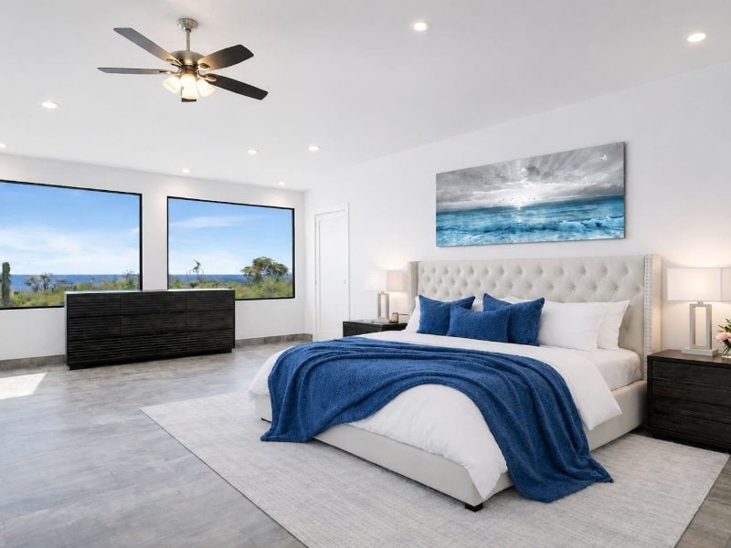 Dormitorio con cama king y vista al desierto en Villa Utopia en Cabo San Lucas